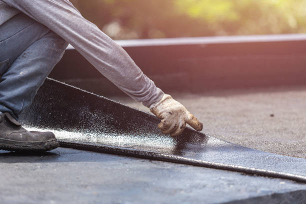 Professional Basement Waterproofing technician working in Kent, WA